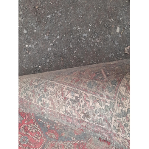 770 - Early 20th century hand woven Persian wool rug (very dirty needs a good clean worn in places) 79 