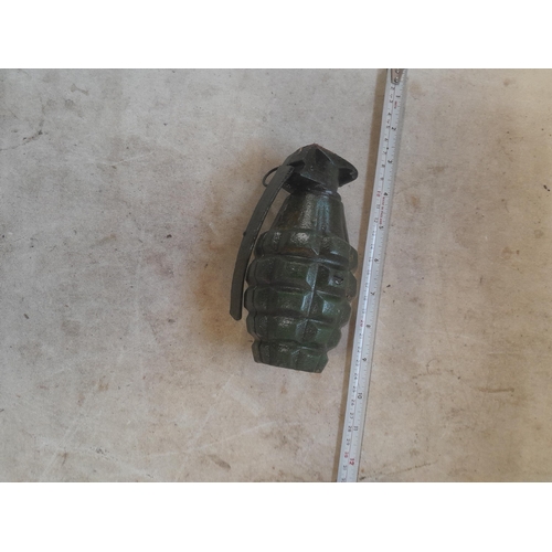 576 - Cast iron money box shaped as a grenade