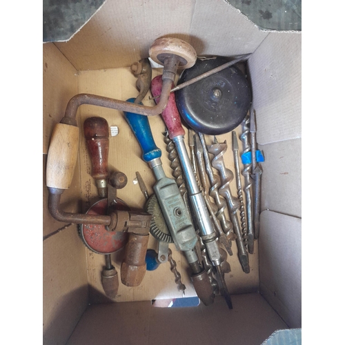 12 - Box of vintage woodworking tools : spokeshaves, drills and bits, saws, bakelite cloth tape etc.