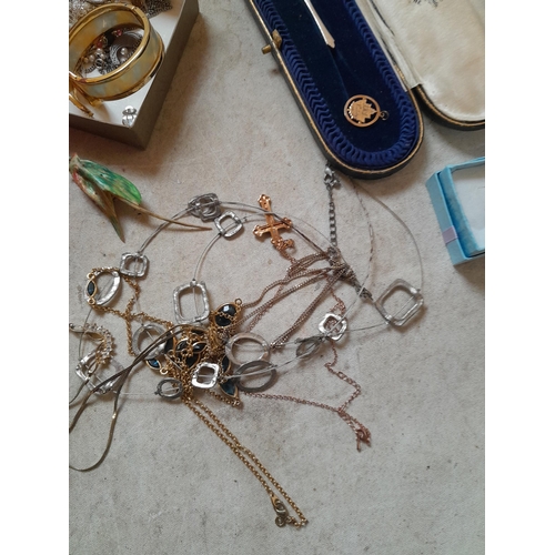 40 - Costume jewellery, silver cut down tea spoon and other items