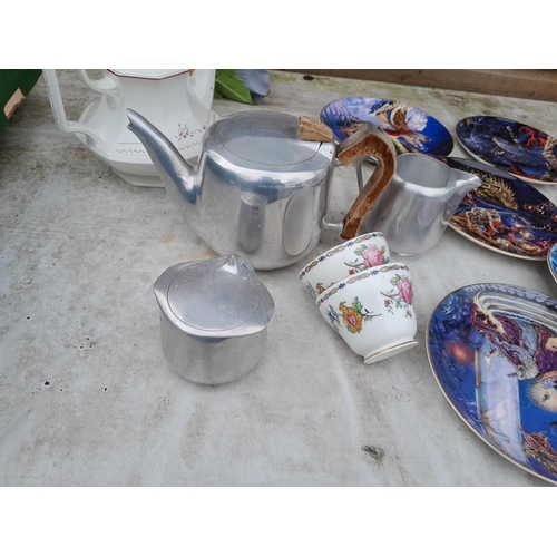 53 - Assorted decorative china and  glassware : Collectors plates, 3 part Picquot ware teaset etc.