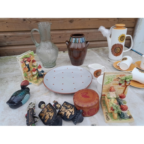 54 - Assorted decorative china and  glassware : resin gnome bookends, studio pottery coffee ware etc.