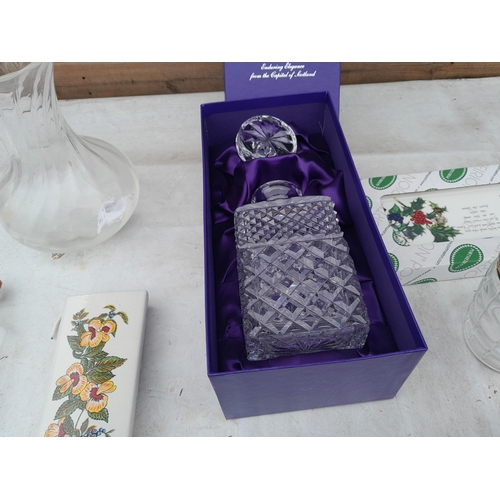 255 - Decorative glassware : Edinburgh crystal decanter in box of issue, glass vases etc.