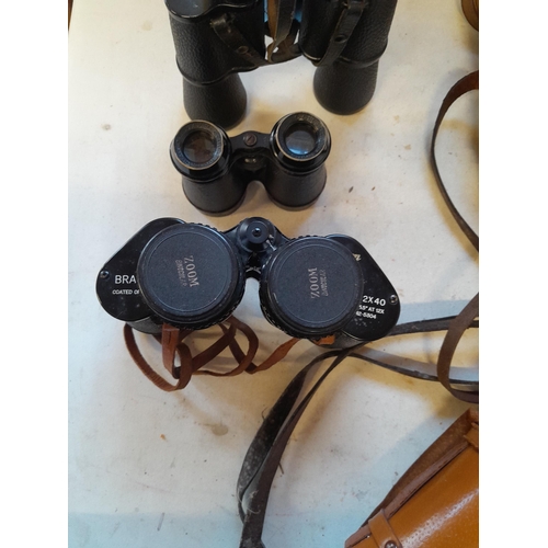 261 - 3 x pairs of binoculars in cases