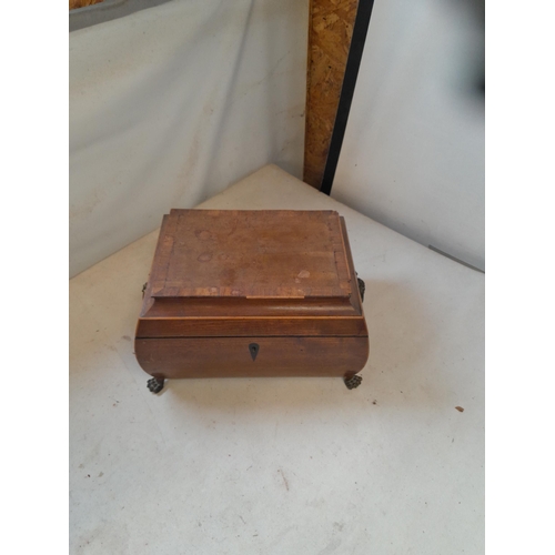 303 - Victorian mahogany sewing box with fully fitted interior on four hairy pad brass feet with some sewi... 