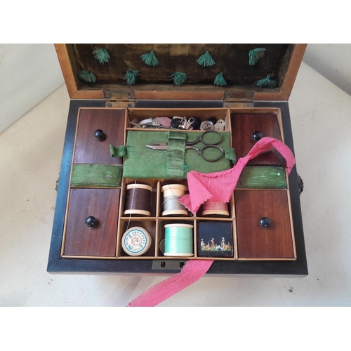 303 - Victorian mahogany sewing box with fully fitted interior on four hairy pad brass feet with some sewi... 