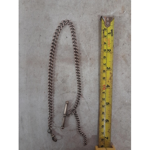 369 - Unmarked watch chain with spinning T bar and gold plated clasp gross weight 36. 9 g