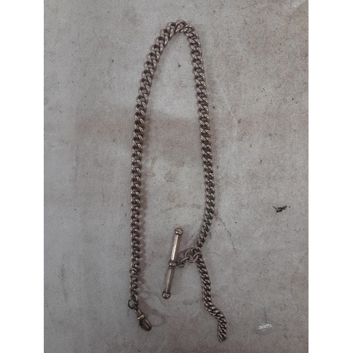 369 - Unmarked watch chain with spinning T bar and gold plated clasp gross weight 36. 9 g