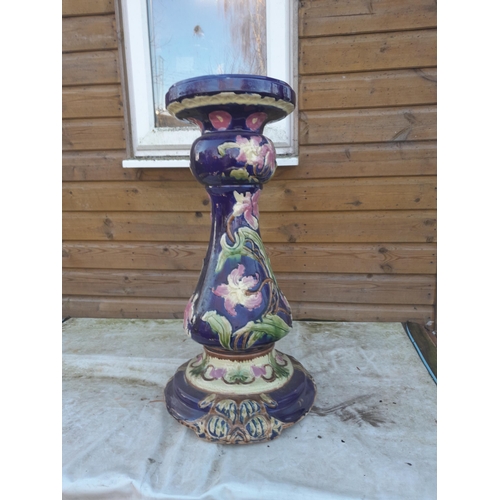 387 - Large and heavy late 19th century majolica vase and pedestal stand in good order apart from chip to ... 