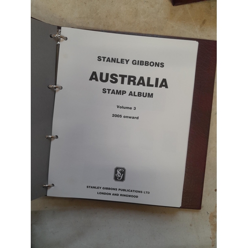 556 - 6 x maroon SG albums with pages for Australia, New Zealand and GB , Canada & Isle of Man. various mo... 