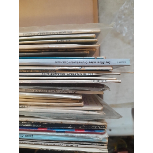 560 - Various records and singles