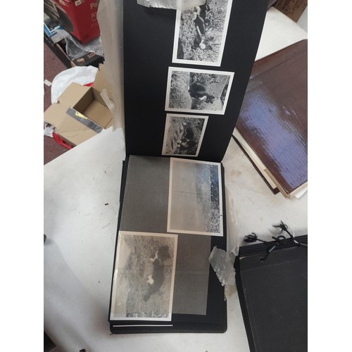 3 - 2 x vintage black and white photograph albums of family snaps, one sparsely filled the other almost ... 