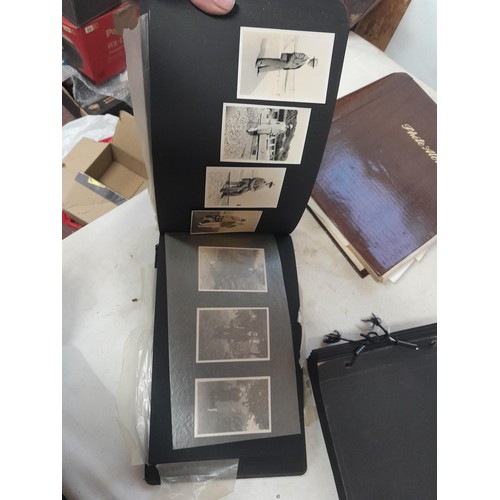 3 - 2 x vintage black and white photograph albums of family snaps, one sparsely filled the other almost ... 