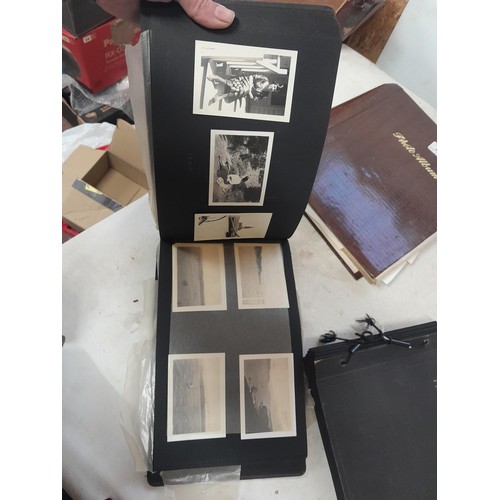 3 - 2 x vintage black and white photograph albums of family snaps, one sparsely filled the other almost ... 