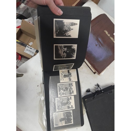 3 - 2 x vintage black and white photograph albums of family snaps, one sparsely filled the other almost ... 