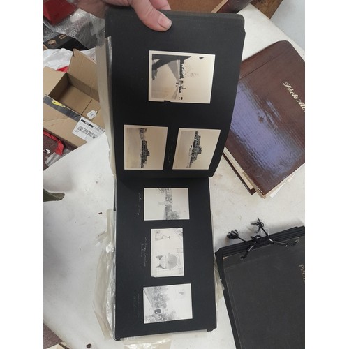 3 - 2 x vintage black and white photograph albums of family snaps, one sparsely filled the other almost ... 