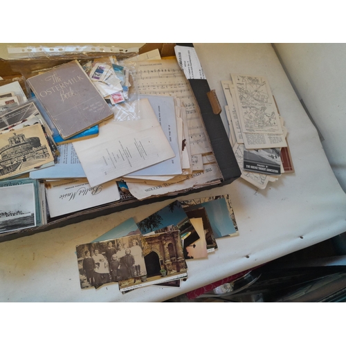 8 - Shallow fruit crate of sheet music, black and white and coloured photographs and postcards, maps, go... 