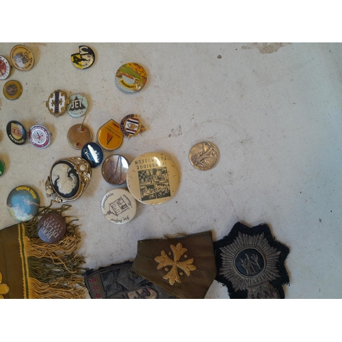 11 - Assorted cap and arm badges, pin badges ad other related items , some military interest