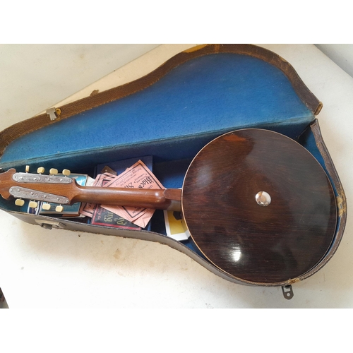 20 - Vintage banjolin ukulele in case with some accessories