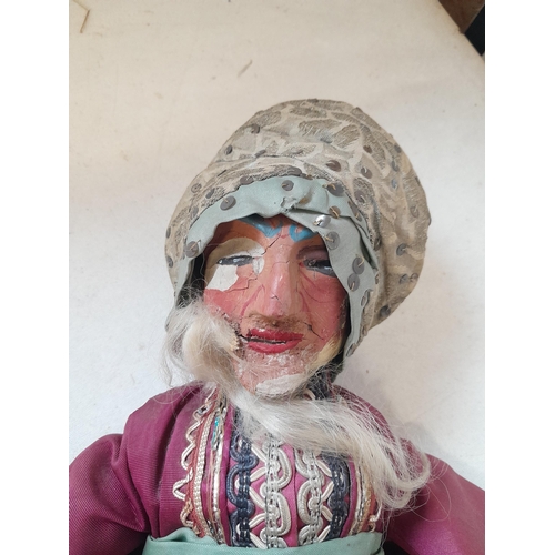 24 - Early 20th century carved and painted wooden doll