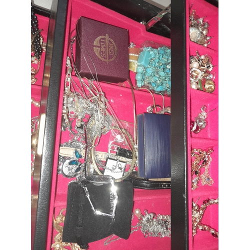 77 - Jewellery casket full of gold plated and other costume jewellery , small amount of silver noticed