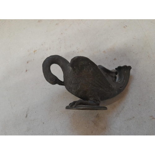 79 - Unusual 19th century French Grand Tours oil lamp modelled in bronze as a swan with grotesque face to... 