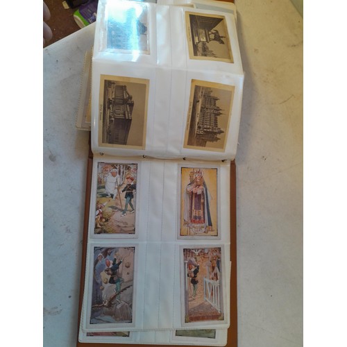 107 - Array of approx 200 greeting cards from early - mid 20th century in an album with two further empty ... 