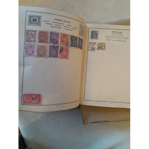 114 - Stamps : a varied collection of mainly used stamps of the world in a variety of albums, schoolboy co... 