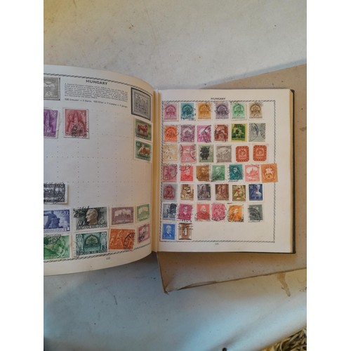 114 - Stamps : a varied collection of mainly used stamps of the world in a variety of albums, schoolboy co... 