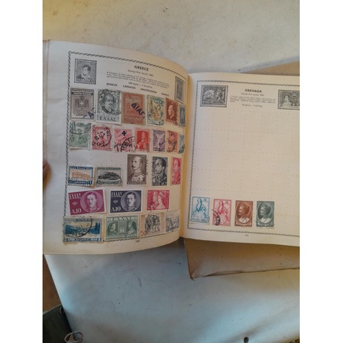 114 - Stamps : a varied collection of mainly used stamps of the world in a variety of albums, schoolboy co... 