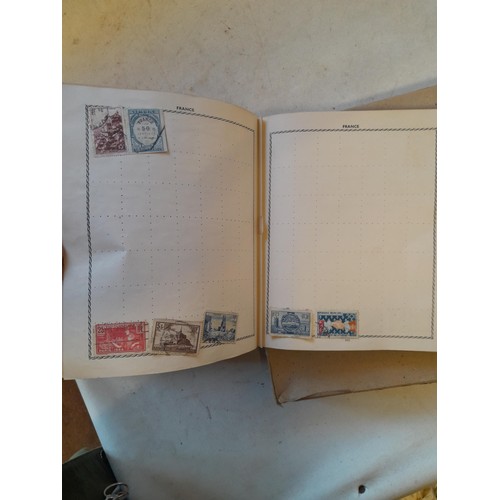 114 - Stamps : a varied collection of mainly used stamps of the world in a variety of albums, schoolboy co... 