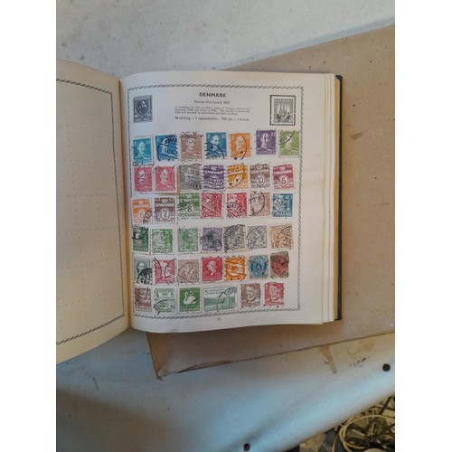 114 - Stamps : a varied collection of mainly used stamps of the world in a variety of albums, schoolboy co... 