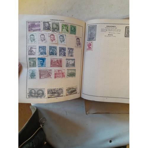 114 - Stamps : a varied collection of mainly used stamps of the world in a variety of albums, schoolboy co... 