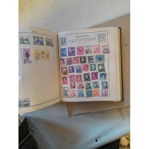 114 - Stamps : a varied collection of mainly used stamps of the world in a variety of albums, schoolboy co... 