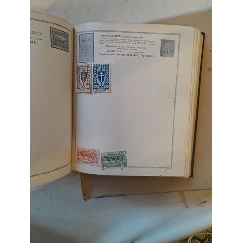 114 - Stamps : a varied collection of mainly used stamps of the world in a variety of albums, schoolboy co... 