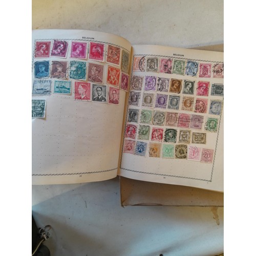 114 - Stamps : a varied collection of mainly used stamps of the world in a variety of albums, schoolboy co... 