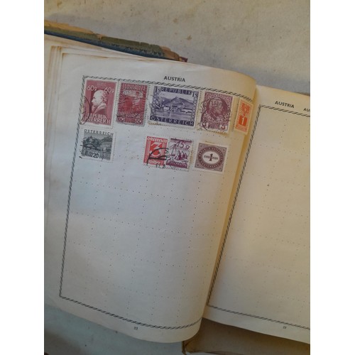 114 - Stamps : a varied collection of mainly used stamps of the world in a variety of albums, schoolboy co... 