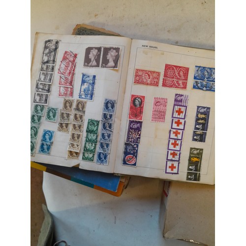 114 - Stamps : a varied collection of mainly used stamps of the world in a variety of albums, schoolboy co... 