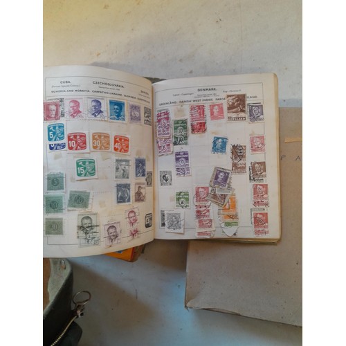 114 - Stamps : a varied collection of mainly used stamps of the world in a variety of albums, schoolboy co... 