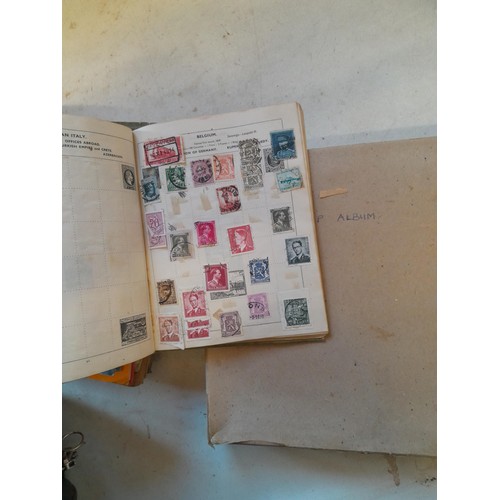 114 - Stamps : a varied collection of mainly used stamps of the world in a variety of albums, schoolboy co... 