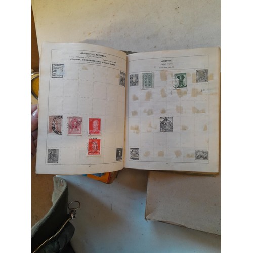 114 - Stamps : a varied collection of mainly used stamps of the world in a variety of albums, schoolboy co... 