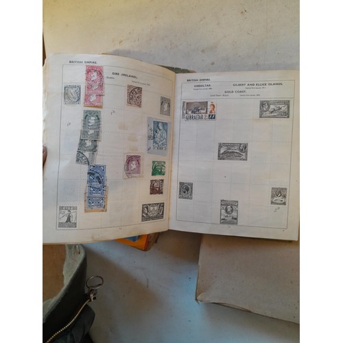 114 - Stamps : a varied collection of mainly used stamps of the world in a variety of albums, schoolboy co... 