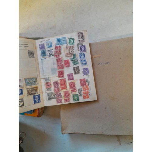 114 - Stamps : a varied collection of mainly used stamps of the world in a variety of albums, schoolboy co... 