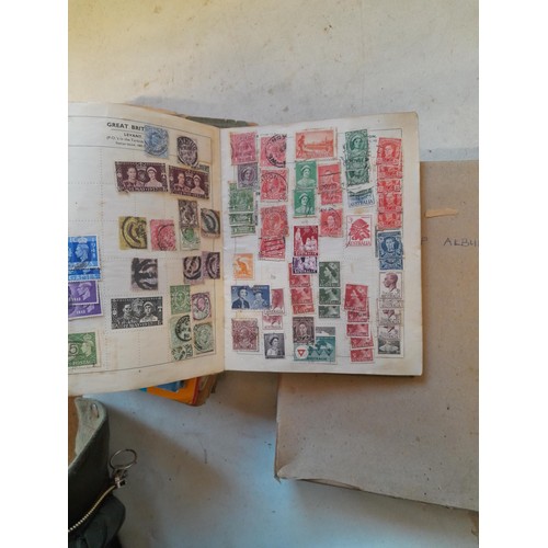 114 - Stamps : a varied collection of mainly used stamps of the world in a variety of albums, schoolboy co... 