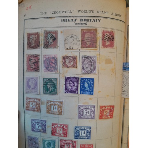 114 - Stamps : a varied collection of mainly used stamps of the world in a variety of albums, schoolboy co... 