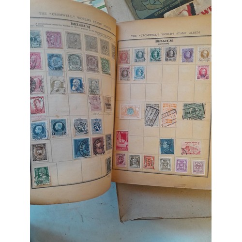 114 - Stamps : a varied collection of mainly used stamps of the world in a variety of albums, schoolboy co... 