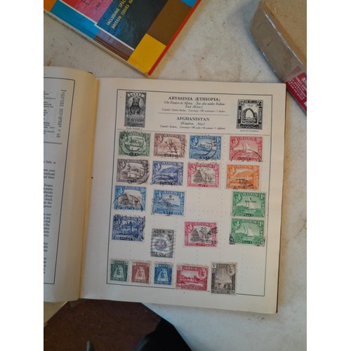 114 - Stamps : a varied collection of mainly used stamps of the world in a variety of albums, schoolboy co... 