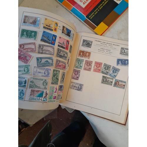 114 - Stamps : a varied collection of mainly used stamps of the world in a variety of albums, schoolboy co... 