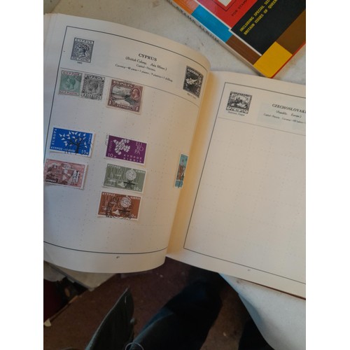 114 - Stamps : a varied collection of mainly used stamps of the world in a variety of albums, schoolboy co... 