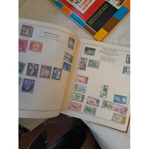 114 - Stamps : a varied collection of mainly used stamps of the world in a variety of albums, schoolboy co... 